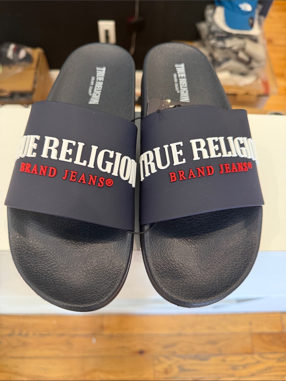 True Religion Navy Slide Sandals with White and Red Logo
